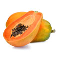 Due frutti di papaia arancione e verde. Uno è dimezzato Due frutti di papaia arancione e verde. Uno è dimezzato