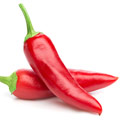 due peperoncini rossi chilli distesi su sfondo bianco